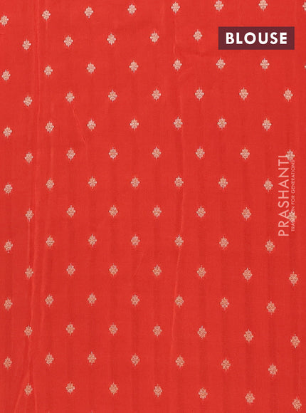 Semi mysore silk saree black and rustic orange with plain body and long rettapet zari woven border