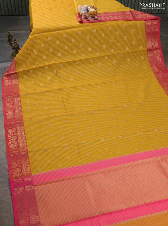 Banarasi semi dupion saree lime yellow and pink with allover zari woven buttas and zari woven border