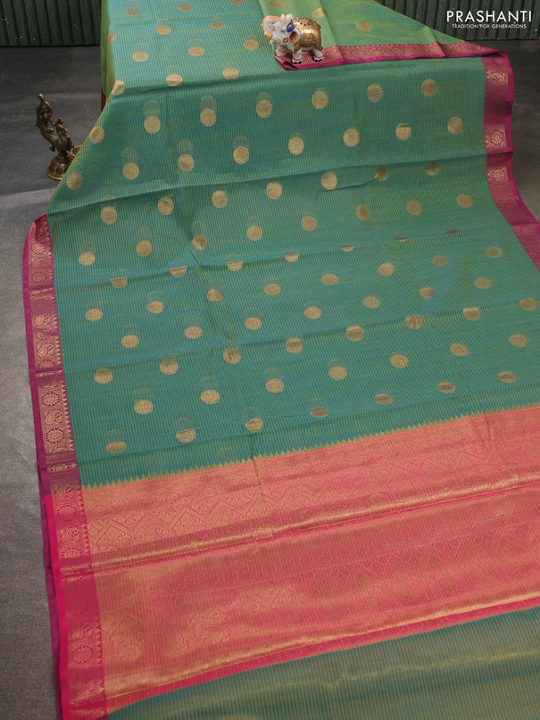 Banarasi semi dupion saree dual shade of bluish green with thread & zari woven buttas and zari woven border