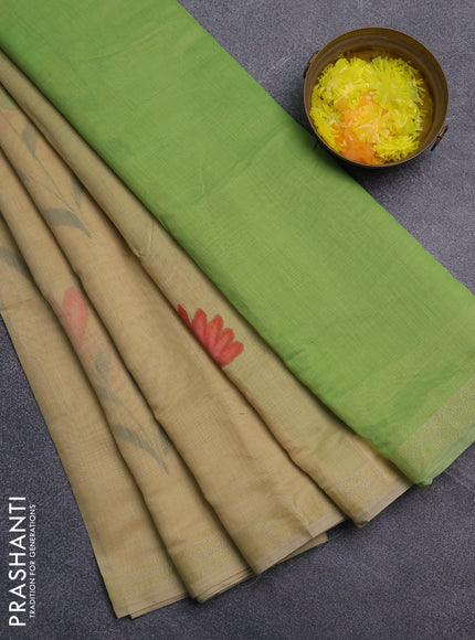 Linen cotton saree sandal and light green with floral hand paint prints and zari woven border