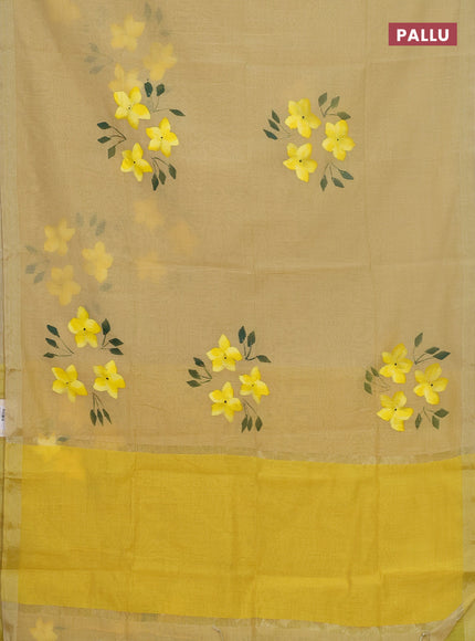 Linen cotton saree sandal and yellow with floral hand paint prints and zari woven border