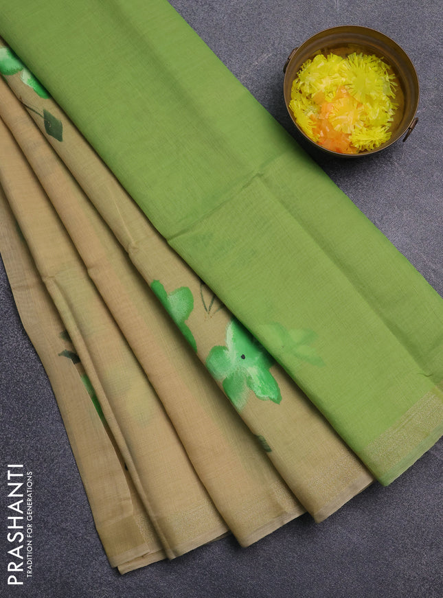 Linen cotton saree sandal and light green with floral hand paint prints and zari woven border