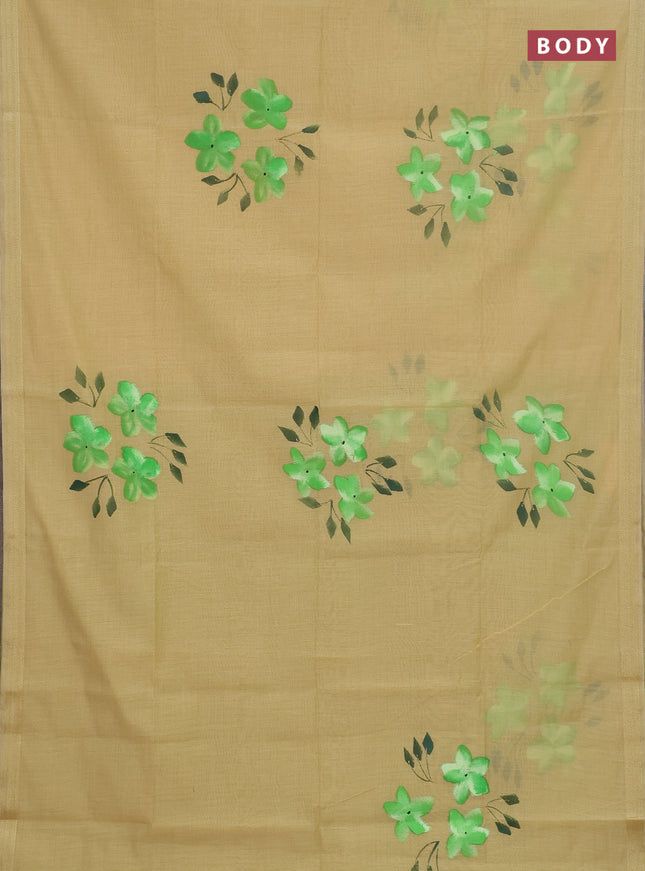 Linen cotton saree sandal and light green with floral hand paint prints and zari woven border
