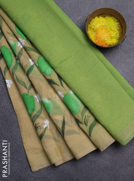 Linen cotton saree sandal and light green with floral hand paint prints and zari woven border