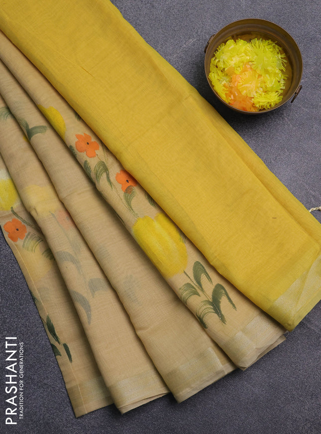 Linen cotton saree sandal and yellow with floral hand paint prints and zari woven border