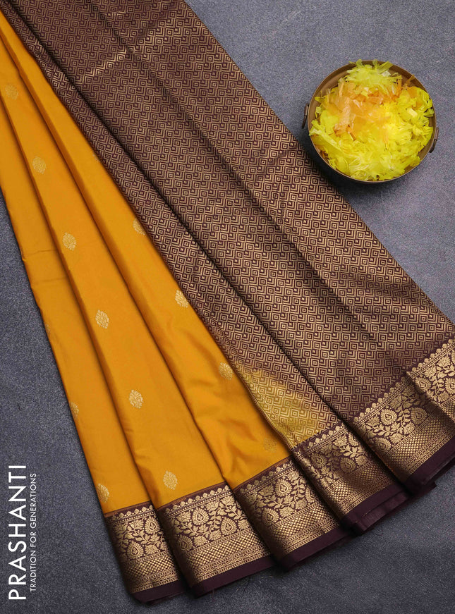 Bangalori silk saree yellow and coffee brown with allover zari woven buttas and zari woven border