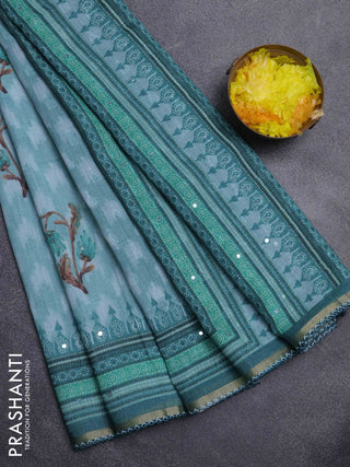 Kota linen saree teal blue and peacock green with allover ikat prints and prints & mirror work border