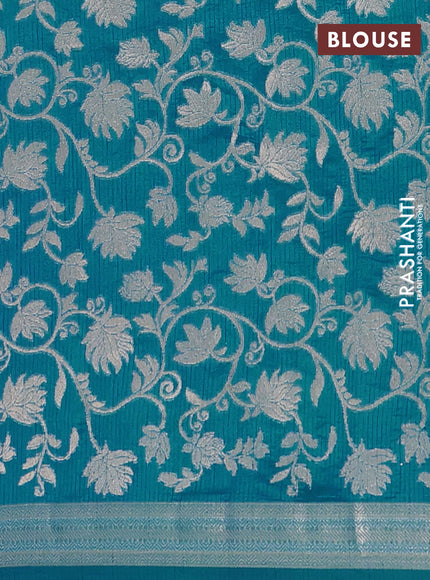 Semi raw silk saree cs blue with zari woven buttas and zari woven border