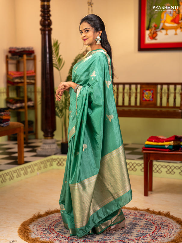 Semi raw silk saree teal green with zari woven buttas and zari woven border