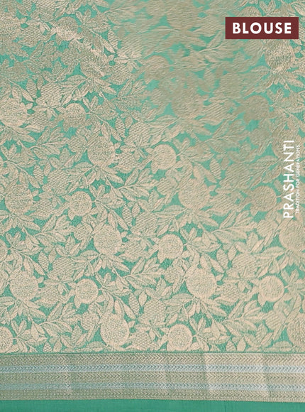 Semi raw silk saree teal green with zari woven buttas and zari woven border