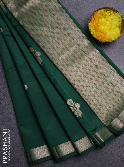 Semi raw silk saree bottle green with zari woven buttas and zari woven border