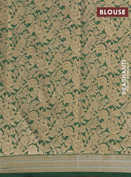 Semi raw silk saree bottle green with zari woven buttas and zari woven border