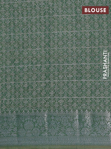 Semi raw silk saree green with allover thread &zari weaves & buttas and silver zari woven border
