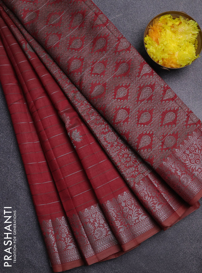 Semi raw silk saree maroon with allover thread &zari weaves & buttas and silver zari woven border