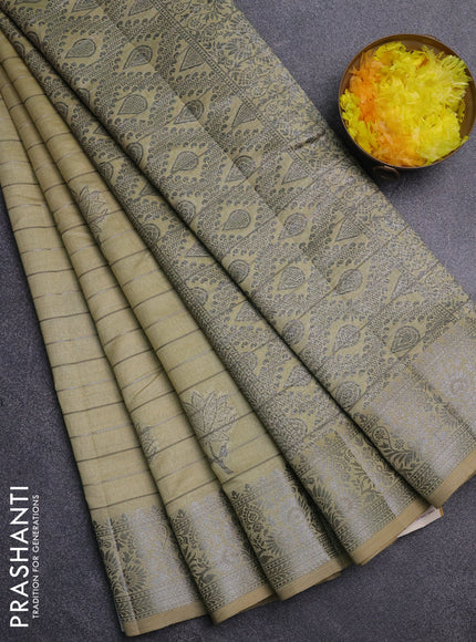 Semi raw silk saree pale yellow with allover thread &zari weaves & buttas and silver zari woven border