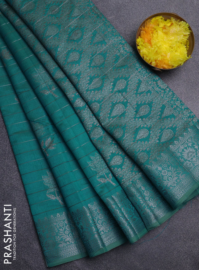 Semi raw silk saree teal blue with allover thread &zari weaves & buttas and silver zari woven border