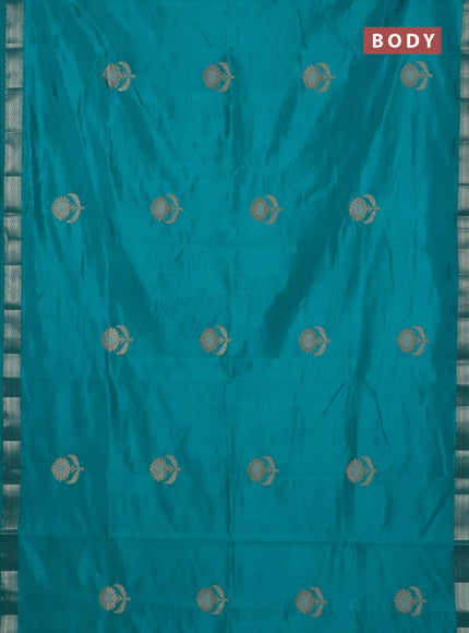 Semi raw silk saree teal green with zari woven buttas and zari woven border