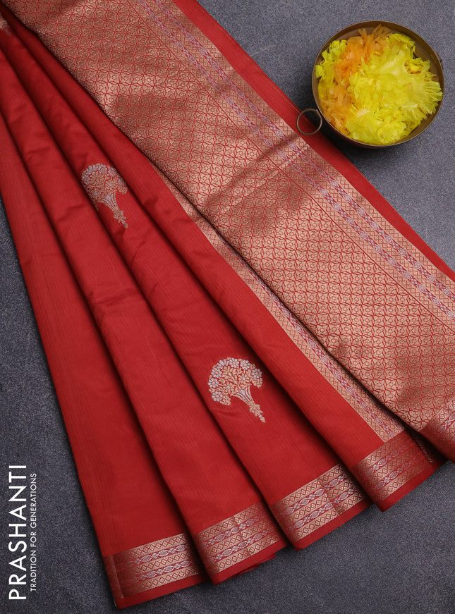 Semi raw silk saree rust shade with zari woven buttas and zari woven border