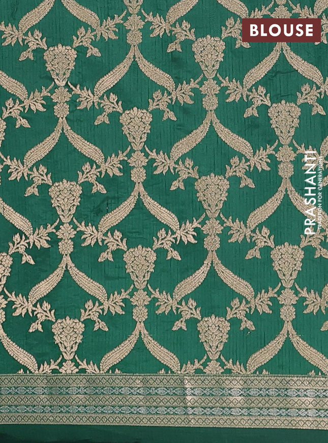 Semi raw silk saree bottle green with zari woven buttas and zari woven border