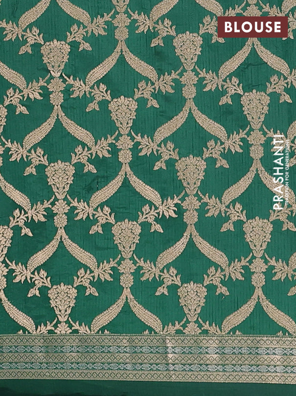 Semi raw silk saree bottle green with zari woven buttas and zari woven border
