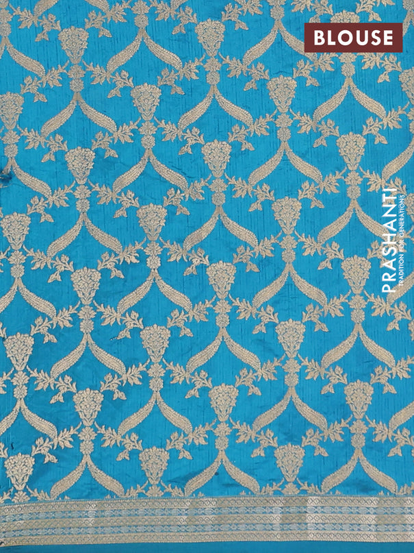 Semi raw silk saree cs blue with zari woven buttas and zari woven border