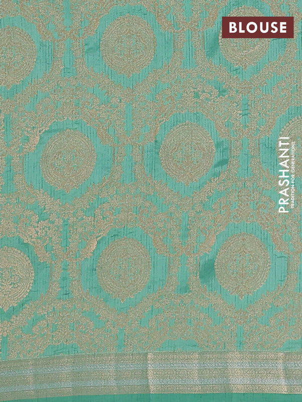 Semi raw silk saree teal green with zari woven buttas and zari woven border