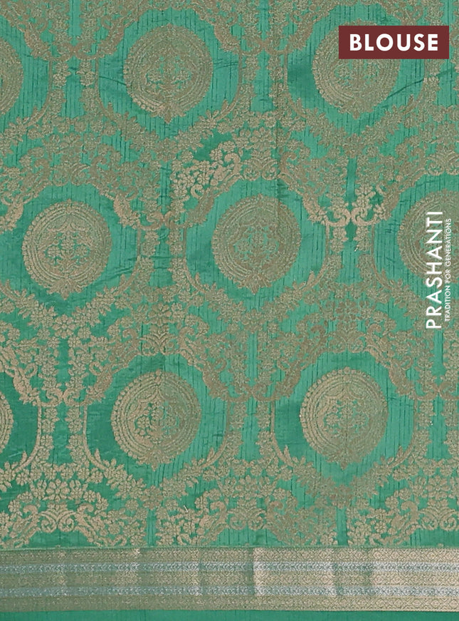 Semi raw silk saree teal green with zari woven buttas and zari woven border