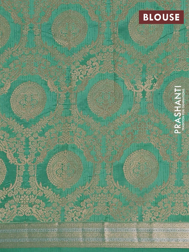 Semi raw silk saree teal green with zari woven buttas and zari woven border