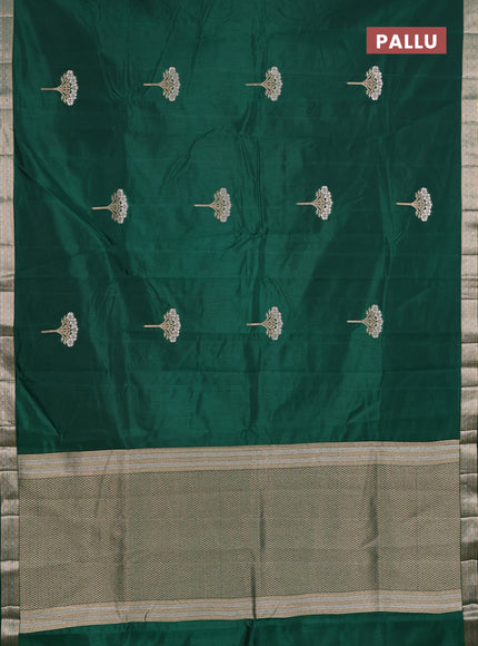 Semi raw silk saree bottle green with zari woven buttas and zari woven border