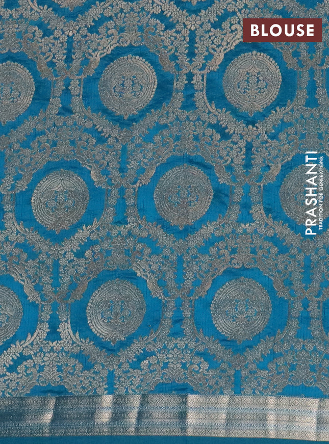 Semi raw silk saree cs blue with zari woven buttas and zari woven border