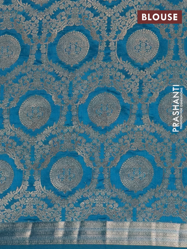 Semi raw silk saree cs blue with zari woven buttas and zari woven border