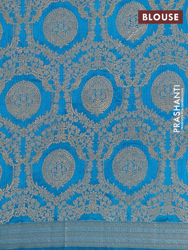 Semi raw silk saree cs blue with zari woven buttas and zari woven border