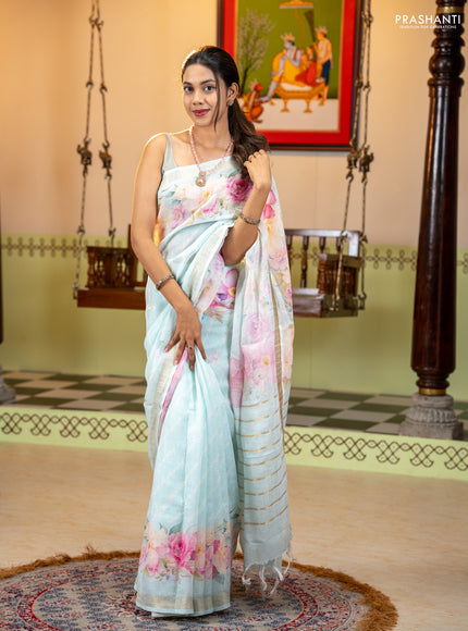 Pure linen saree light blue with allover geometric prints and zari woven border