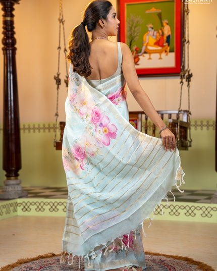 Pure linen saree light blue with allover geometric prints and zari woven border