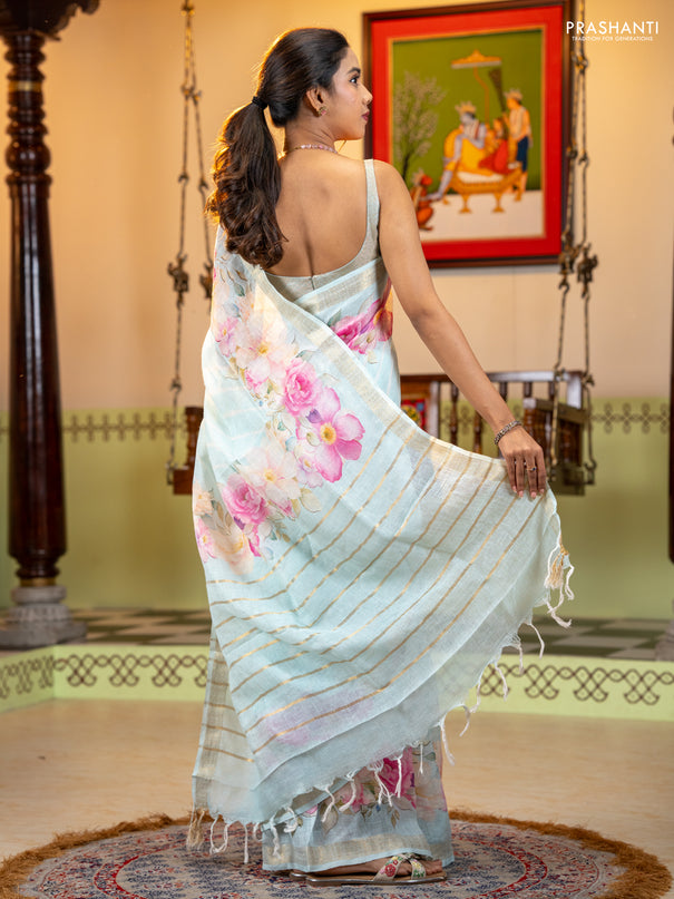 Pure linen saree light blue with allover geometric prints and zari woven border