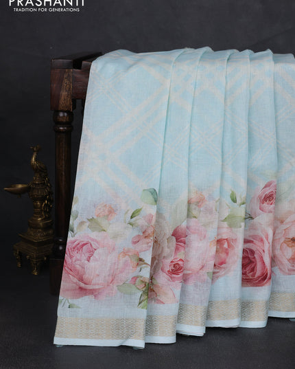 Pure linen saree light blue with allover geometric prints and zari woven border