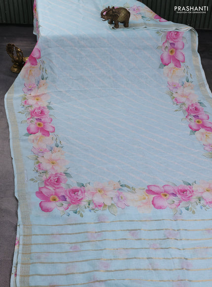 Pure linen silk saree light blue with allover leheriya style prints and zari woven border