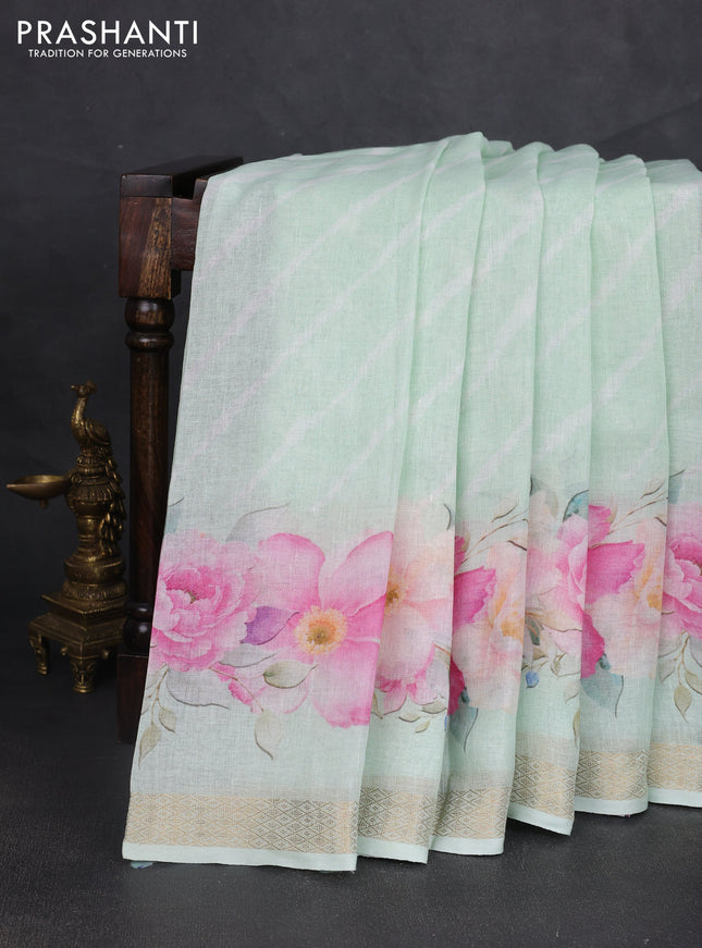 Pure linen silk saree pastel green with allover leheriya style prints and zari woven border