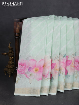 Pure linen saree pastel green with allover leheriya style prints and zari woven border