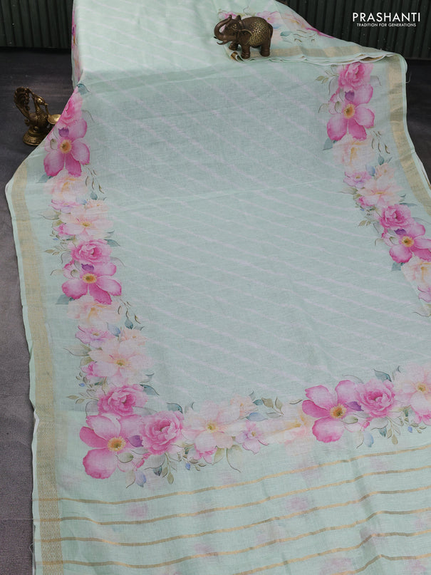 Pure linen saree pastel green with allover leheriya style prints and zari woven border