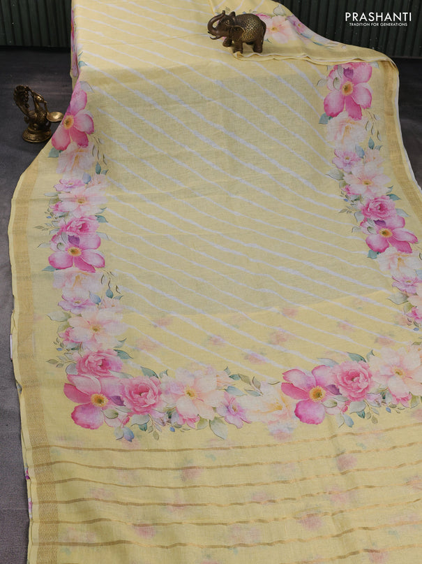 Pure linen saree pale yellow with allover leheriya style prints and zari woven border