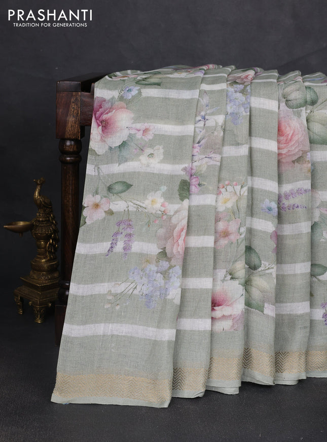 Pure linen silk saree pastel green and off white with allover floral digital prints and zari woven border