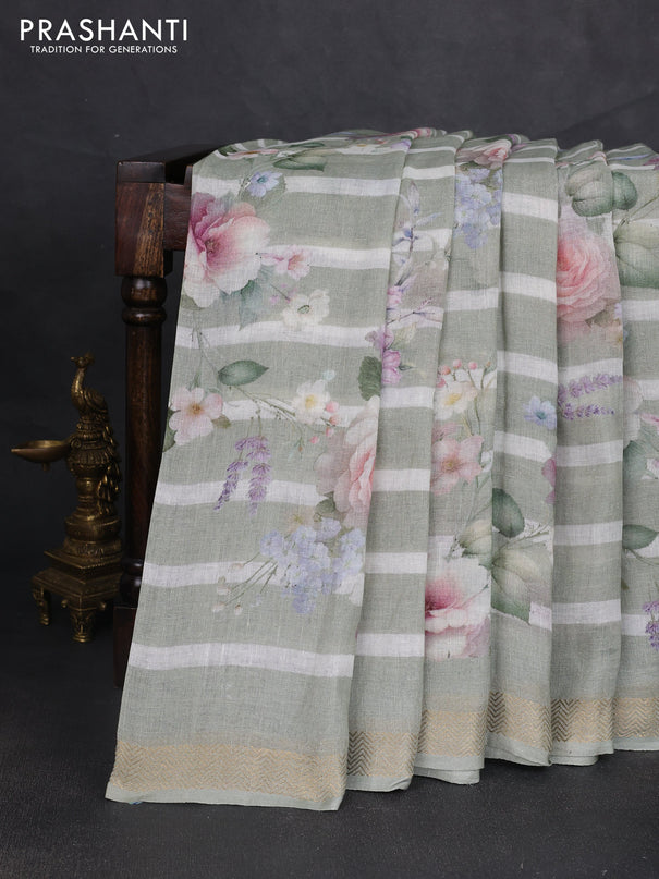 Pure linen saree pastel green and off white with allover floral digital prints and zari woven border