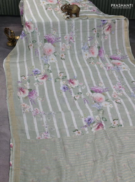Pure linen silk saree pastel green and off white with allover floral digital prints and zari woven border