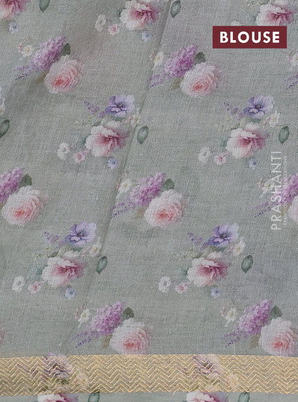 Pure linen silk saree pastel green and off white with allover floral digital prints and zari woven border