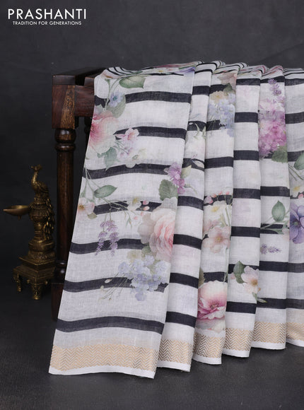 Pure linen silk saree off white and black with allover floral digital prints and zari woven border