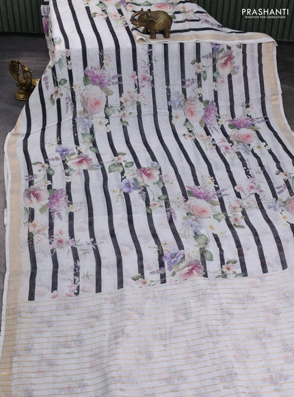 Pure linen silk saree off white and black with allover floral digital prints and zari woven border