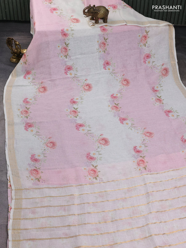 Pure linen saree light pink and cream with allover floral digital prints and zari woven border