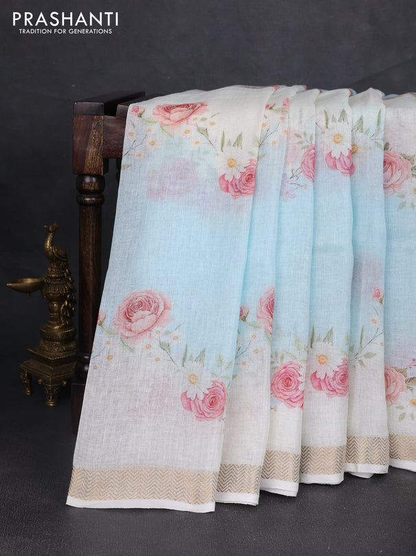 Pure linen saree light blue and cream with allover floral digital prints and zari woven border