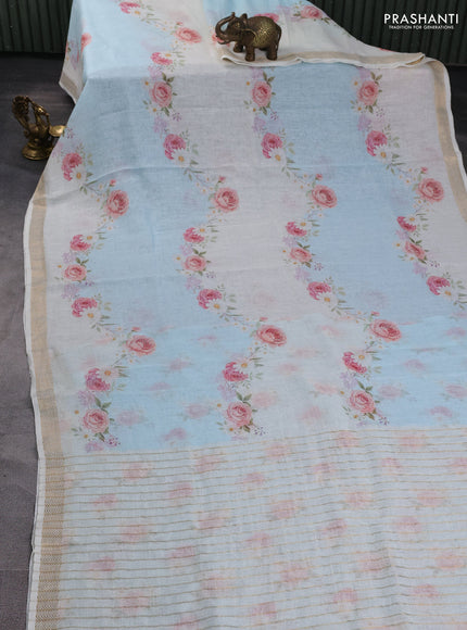 Pure linen silk saree light blue and cream with allover floral digital prints and zari woven border